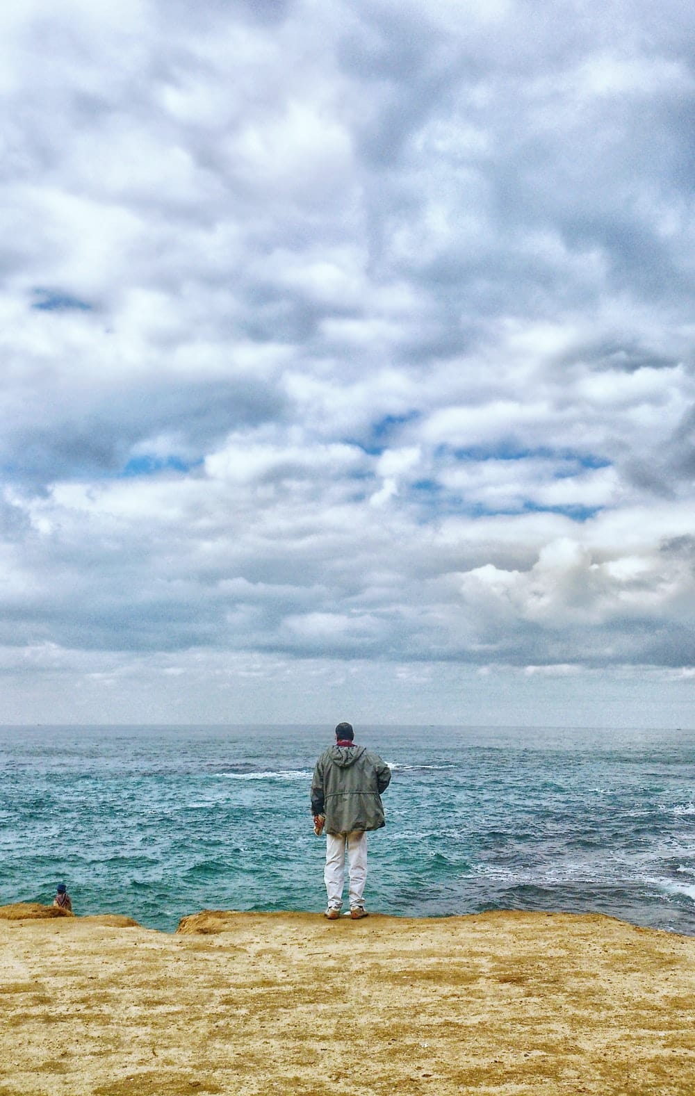 Cross Stitch | Alexandria - Man Standing In Front Of Sea - Cross Stitched