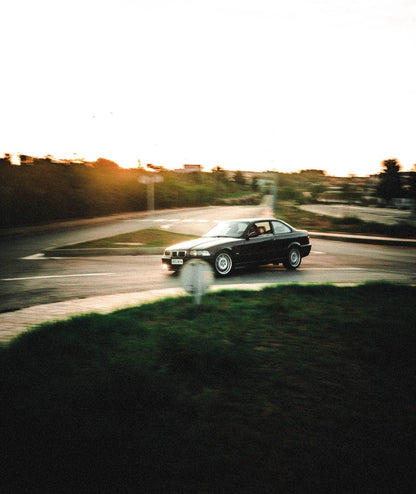 Cross Stitch | Algiers - Black Coupe On Road During Daytime - Cross Stitched