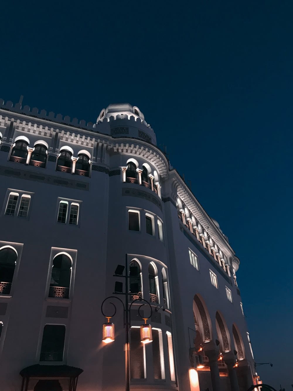 Cross Stitch | Algiers - Low Angle Photography Of Gray Concrete Building Under Blue Sky During Daytime - Cross Stitched