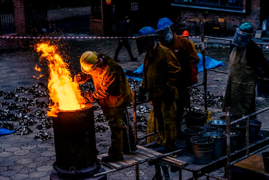 Cross Stitch | Asp - Group Of Man Lining In Front Of Can With Fire - Cross Stitched