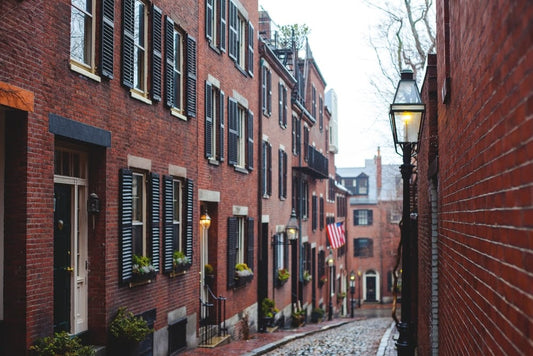 Cross Stitch | Boston - Brown Concrete Building With Patio Light During Daytime - Cross Stitched