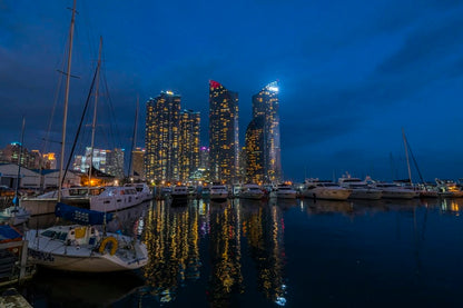 Cross Stitch | Busan - White Boat On Body Of Water Near City Buildings During Night Time - Cross Stitched