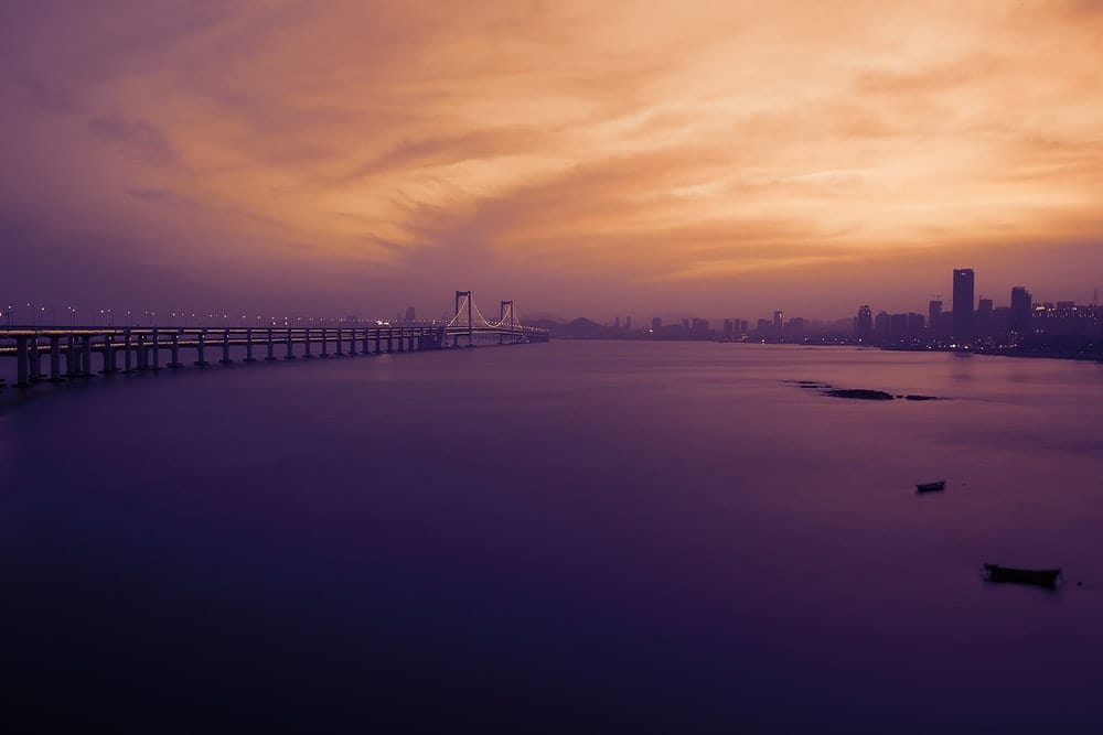 Cross Stitch | Dalian - Gray Bridge Above Body Of Water During Golden Hour Photography - Cross Stitched