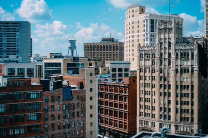 Cross Stitch | Detroit - Aerial Photography Of Brown And Beige Buildings - Cross Stitched