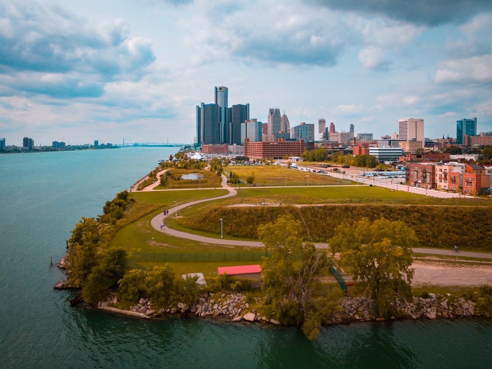 Cross Stitch | Detroit - Green Grassfield Beside A Body Of Water - Cross Stitched