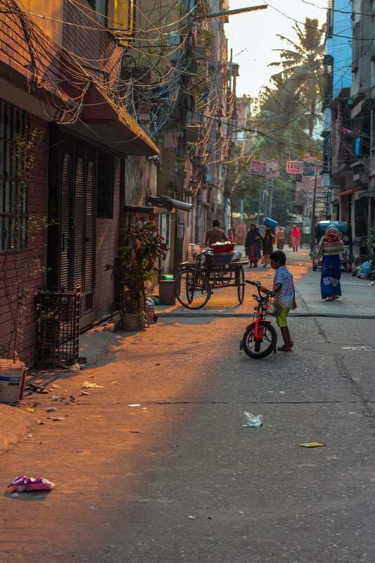 Cross Stitch | Dhaka - Red And Black Bicycle On Sidewalk During Daytime - Cross Stitched