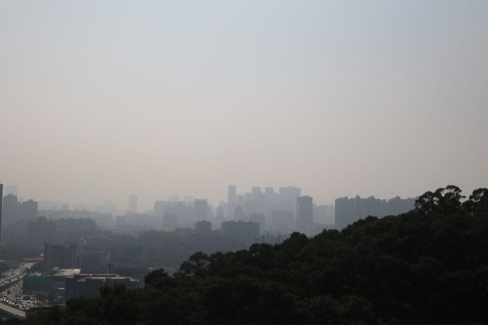 Cross Stitch | Fuzhou - White High Rise Buildings During Daytime - Cross Stitched