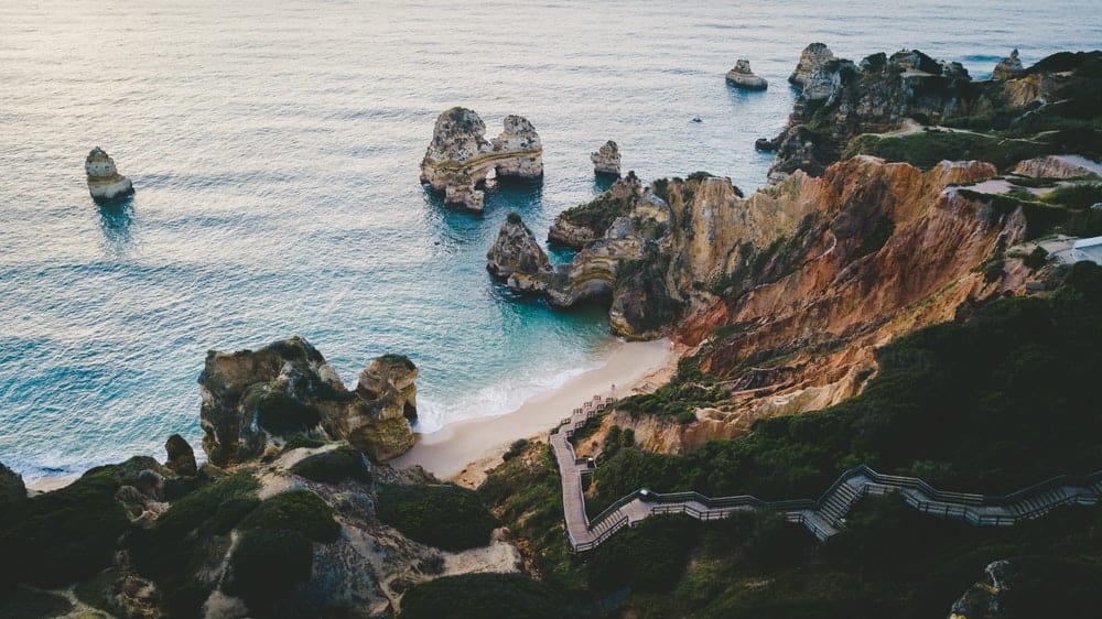 Cross Stitch | Lagos - Cliff Near Body Of Water With Boulders - Cross Stitched