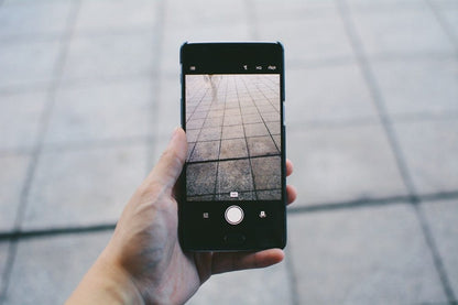 Cross Stitch | Mianyang - Person Taking Picture Of Concrete Pavement - Cross Stitched