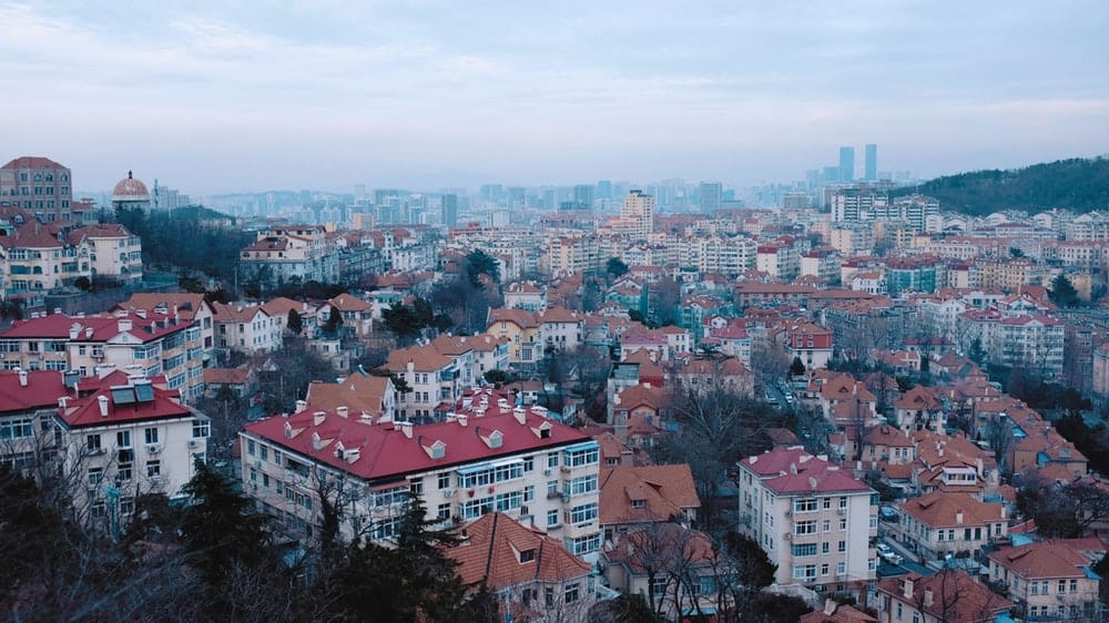 Cross Stitch | Qingdao - Aerial Photo Of Cityscape During Daytime - Cross Stitched