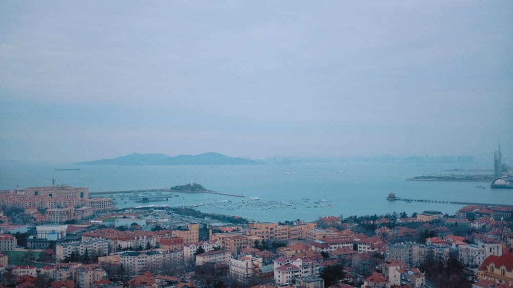 Cross Stitch | Qingdao - Top View Of Cityscape Facing Ocean - Cross Stitched