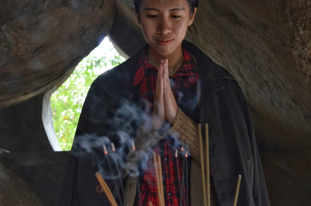 Cross Stitch | Shantou - Person Praying In Cave - Cross Stitched